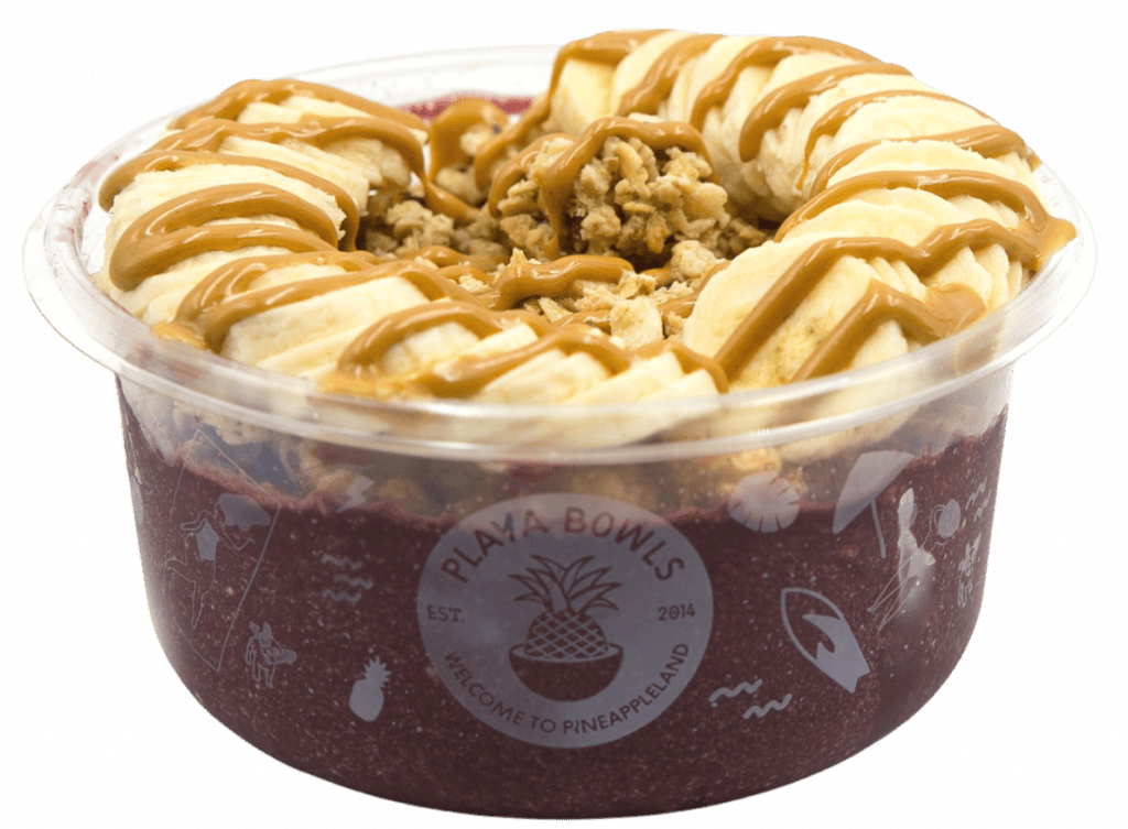 Pure acai with chocolate protein topped with granola, banana, peanut butter