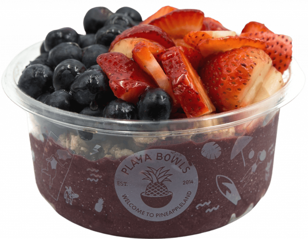 Pure acai topped with granola, blueberry, strawberry, honey